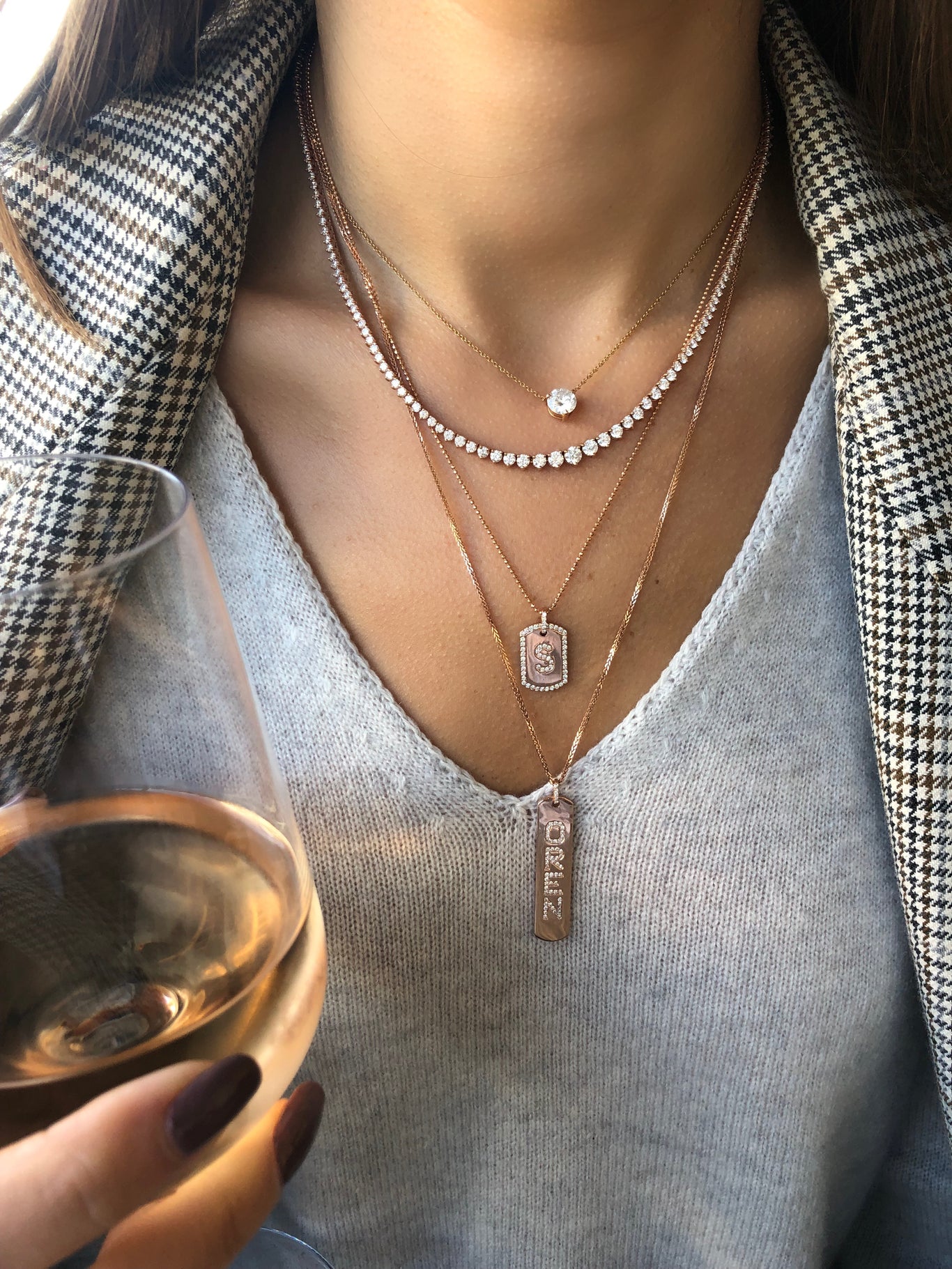 6.50 Carat Graduating Tennis Necklace shown layered between the Diamond Initial Dogtag Necklace and the Longtag Necklace.