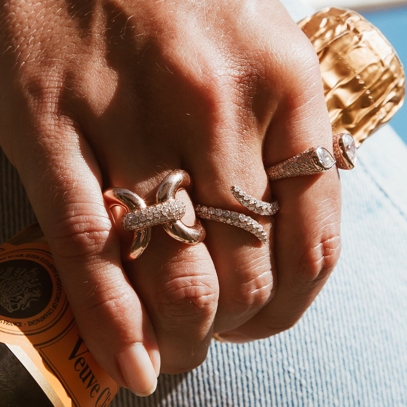 Love Lock Ring shown with the Viper Ring and Medium Twin Ring