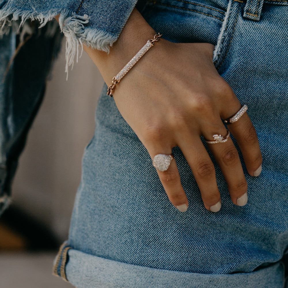 The stunning Bling Ring is showing with our Swing Ring, Flat Top Dome Ring, and Pantheon Bracelet. 
