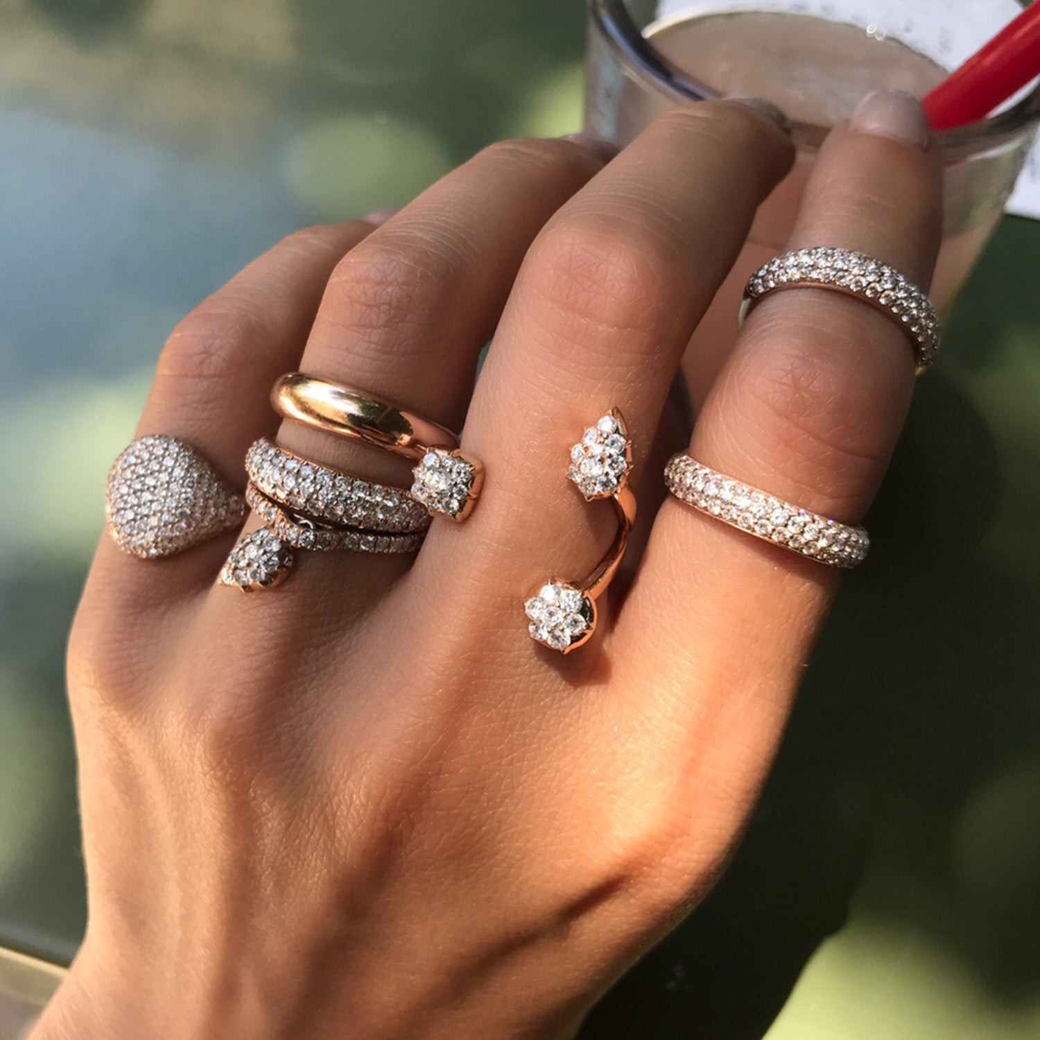 The Bling Ring is shown stacked with our Gemini Ring, Swing Ring, Throne Ring, and Olympus Ring.