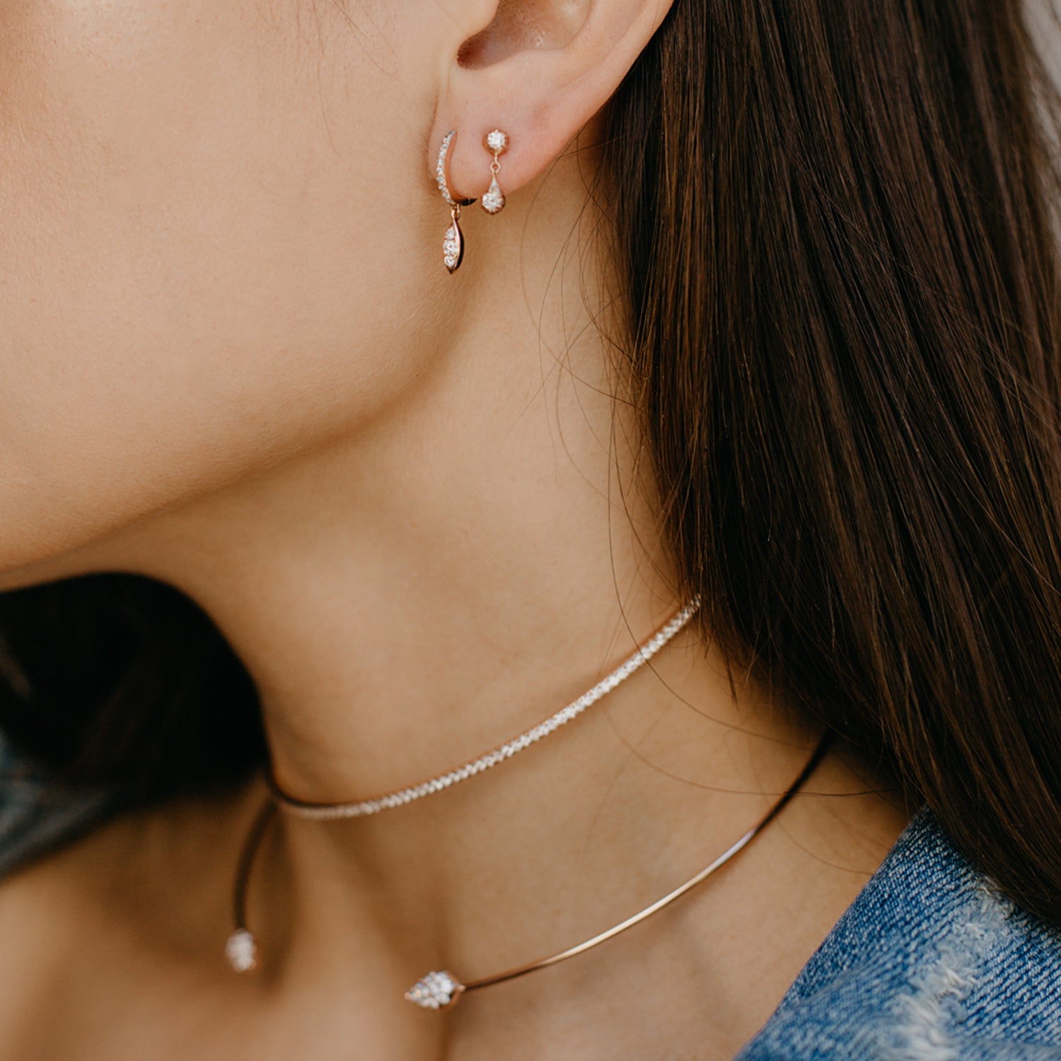 The Delilah Huggies shown paired with the Belle Earring and Infinity Choker.