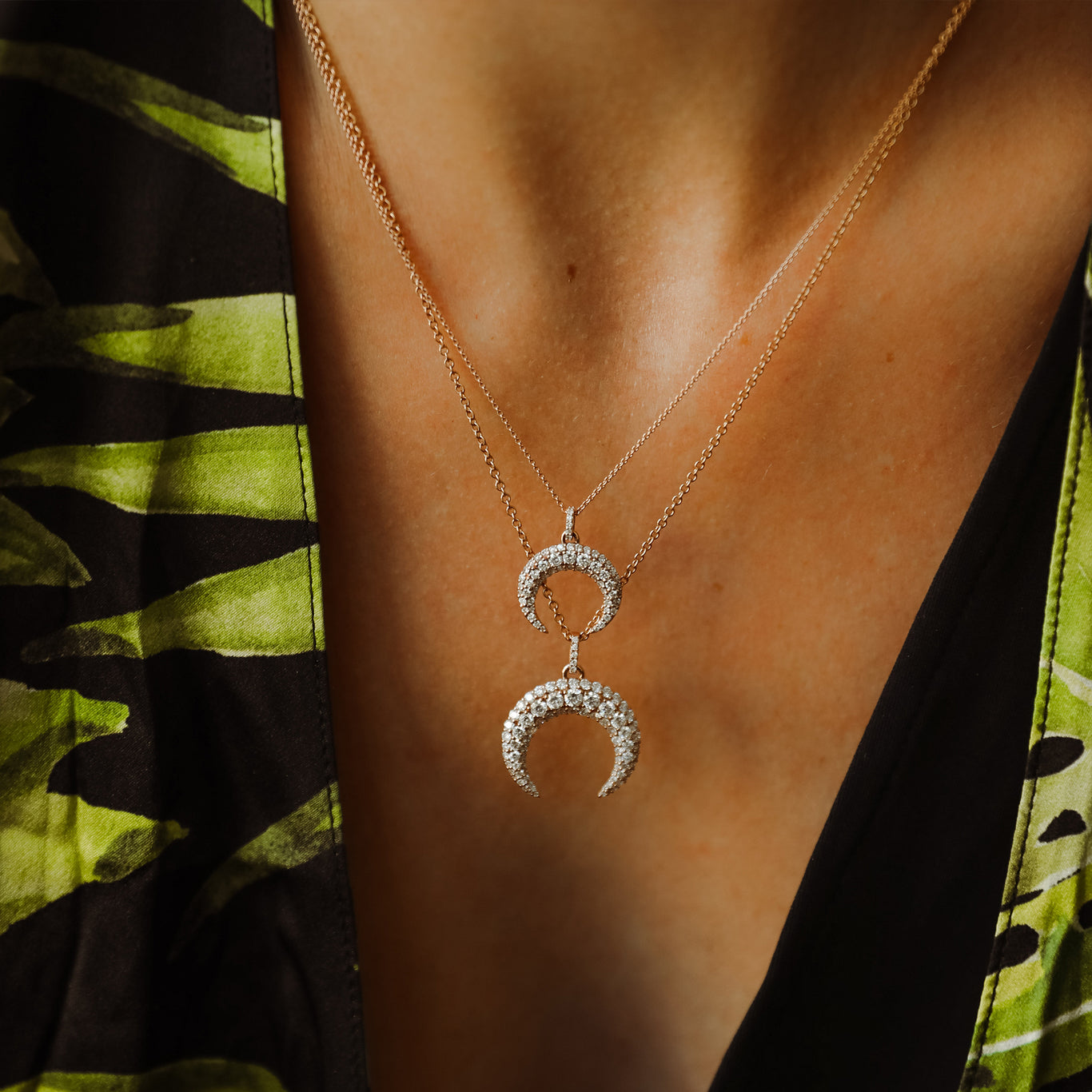 The Diamond Dharma shown paired with the Mini Diamond Dharma Necklace. Both necklaces are rose gold.