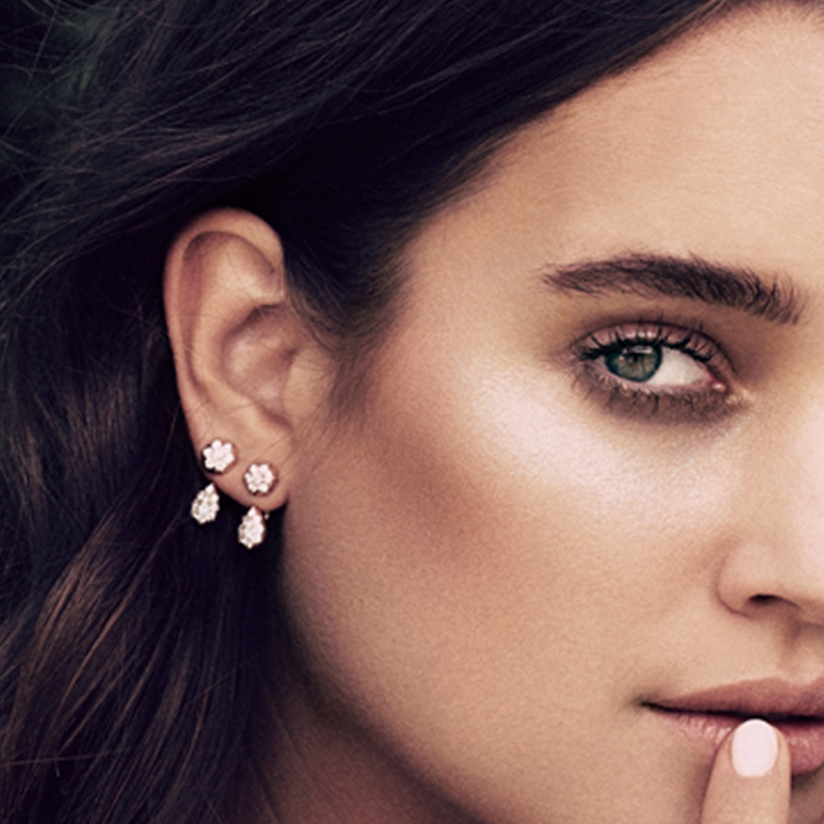 Here, the Elixir Earrings are shown in rose gold.