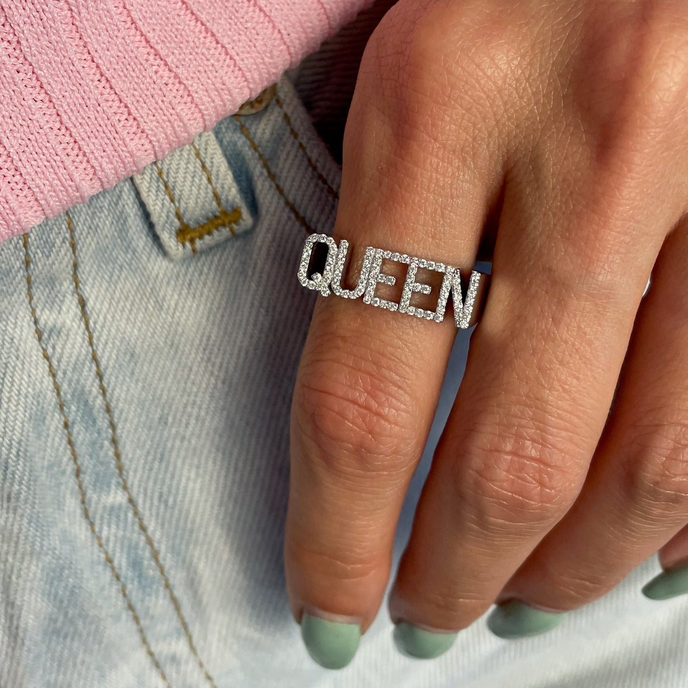 The Custom Name Ring shown with Queen monogram