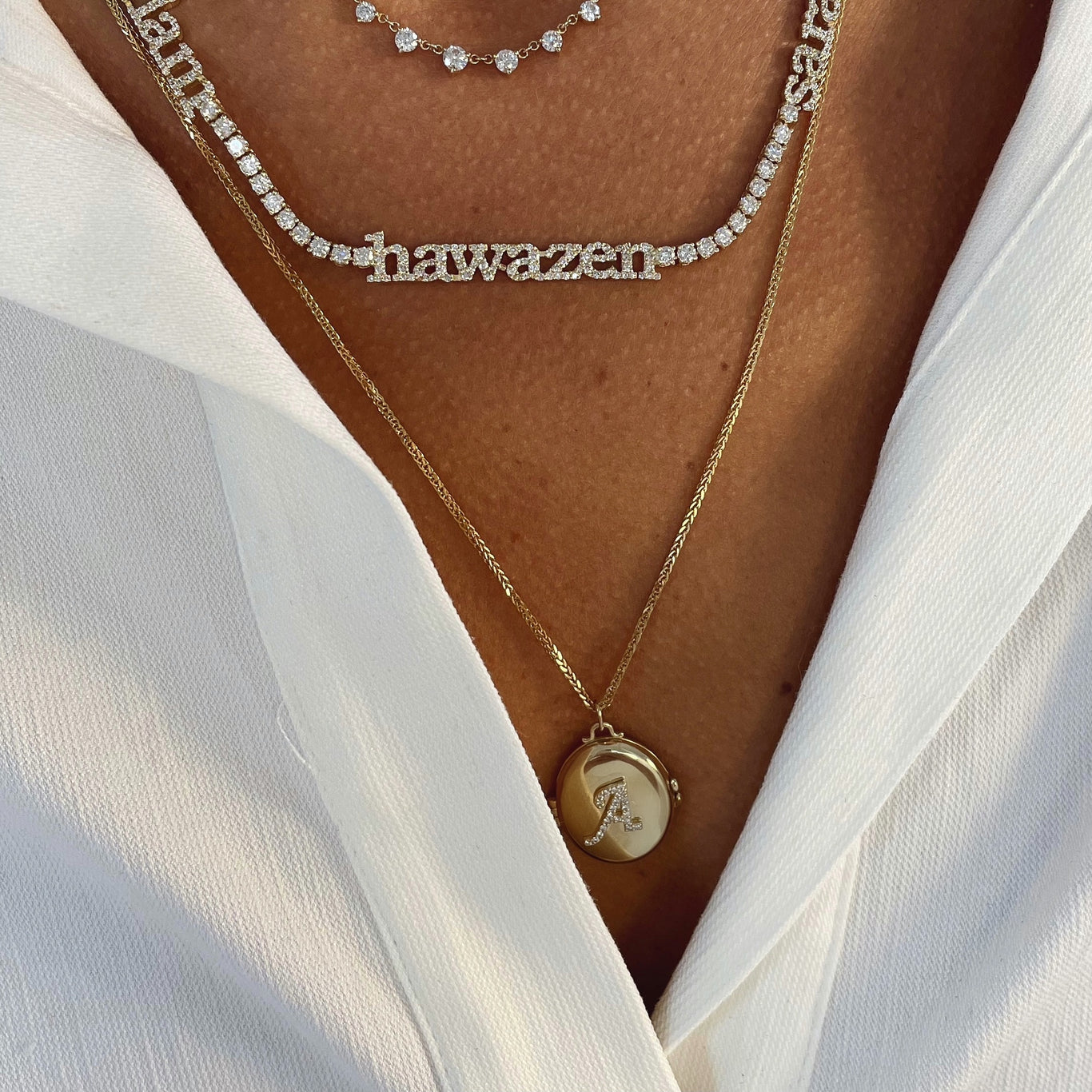 Initial locket necklace shown in letter A
