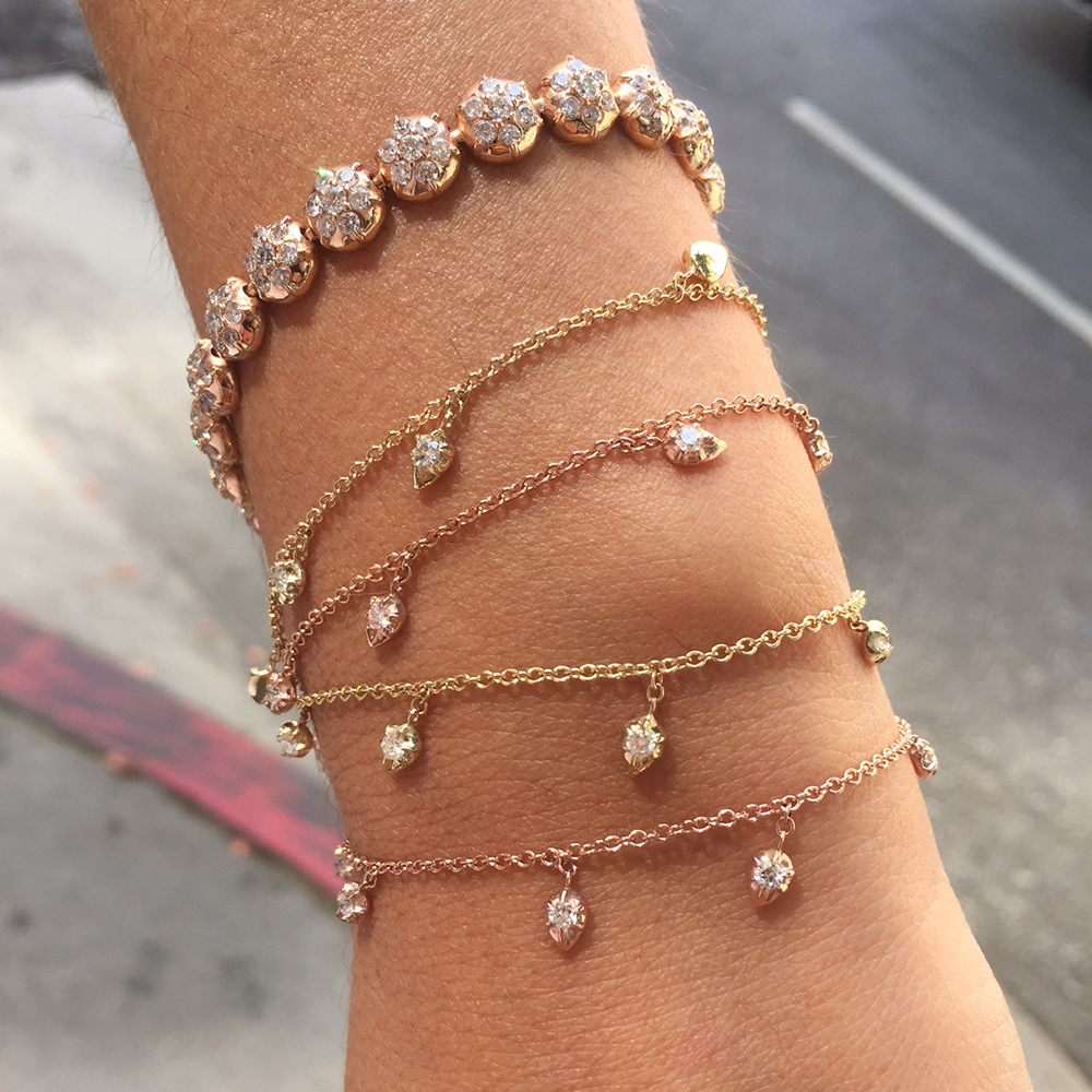 Multiple Lily Bracelets shown stacked with the Crown Tennis Bracelet.