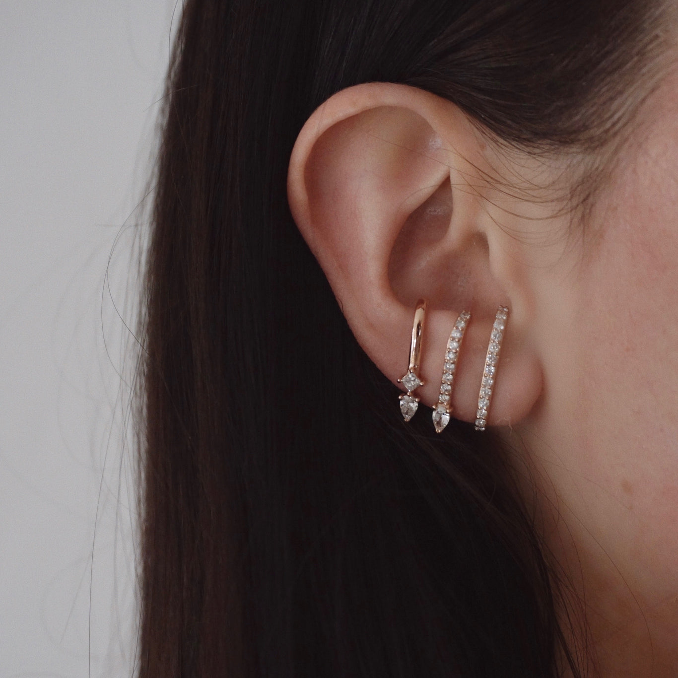 Stiletto Lobe Earring shown with the Pear Lobe Earring and Superhuggy