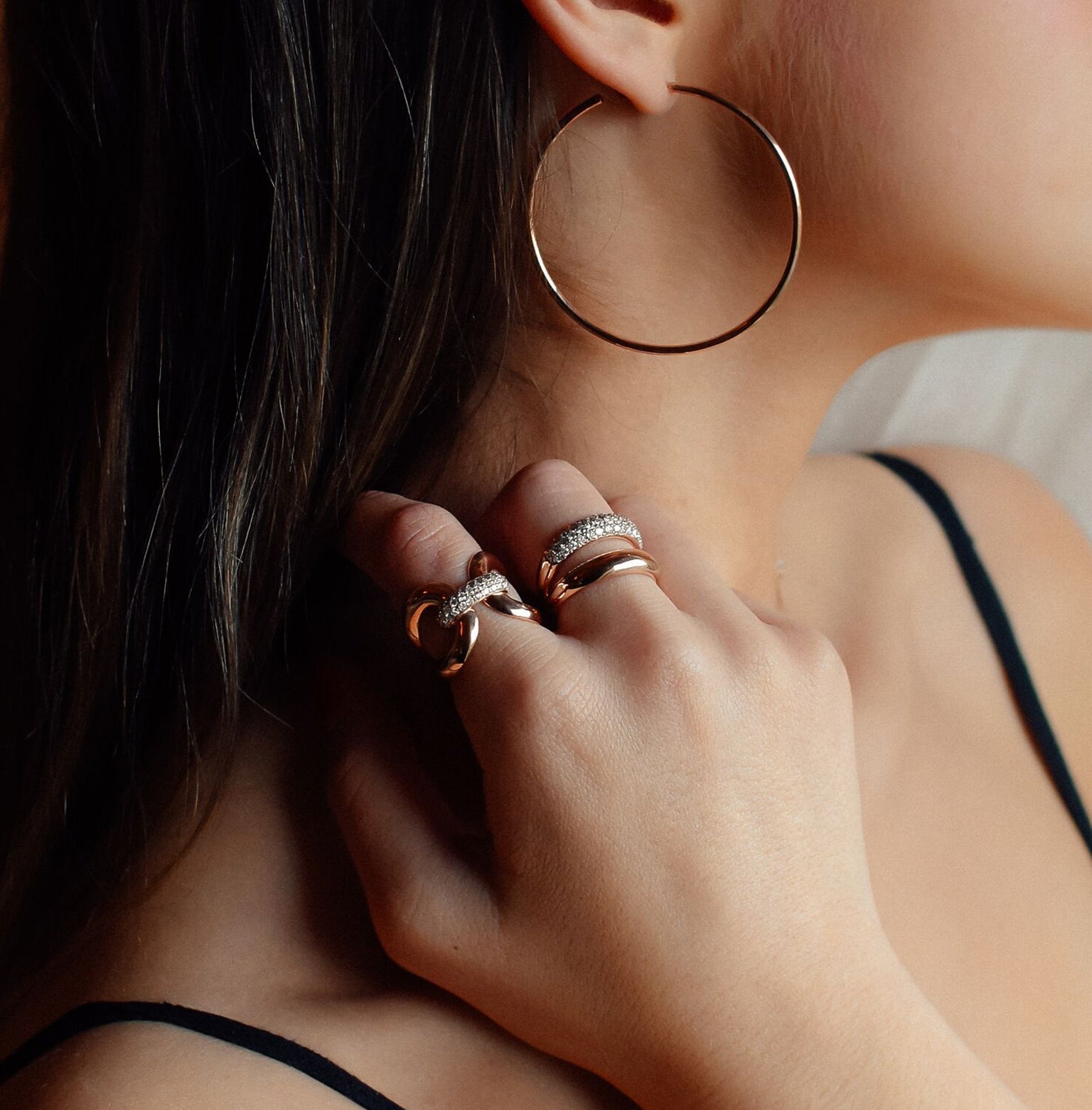 5cm Skinny Hoops shown in rose gold styled with the Love Lock Ring and Gemini Ring.