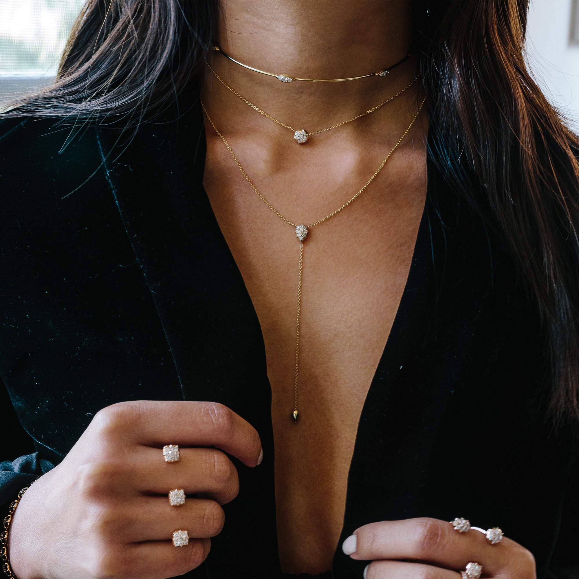The Luna Choker shown layered with the Bullet Choker Chain and Stella Lariat in yellow gold.