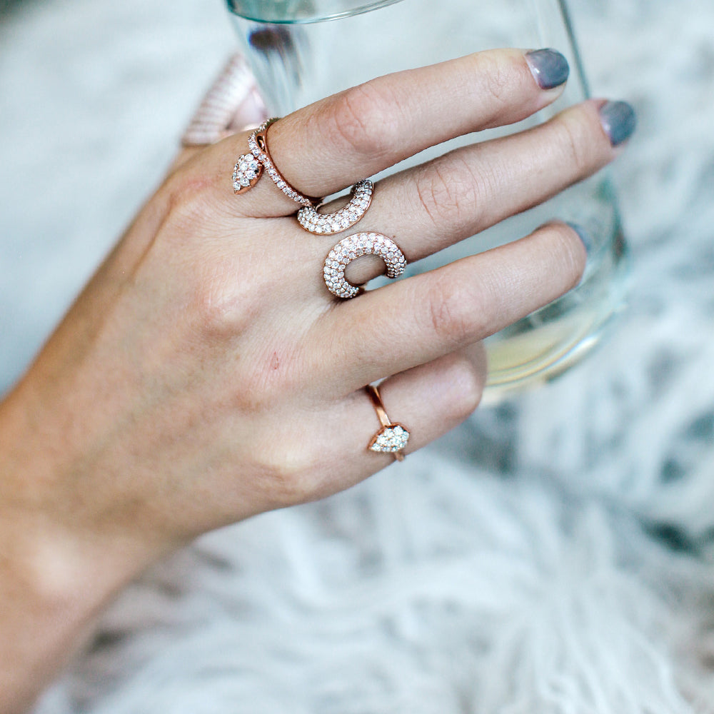 The Elixir Mini Ring is shown with the Medusa Ring and Swing Ring.
