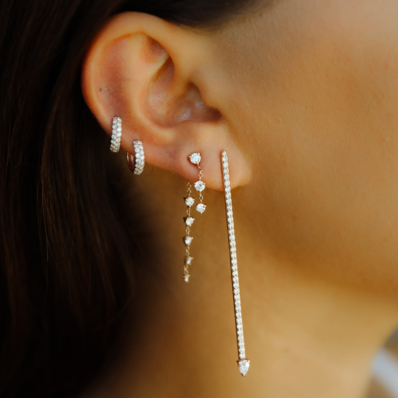 The Millo Earrings shown stacked with the Starstruck Earrings and Boom Huggies.