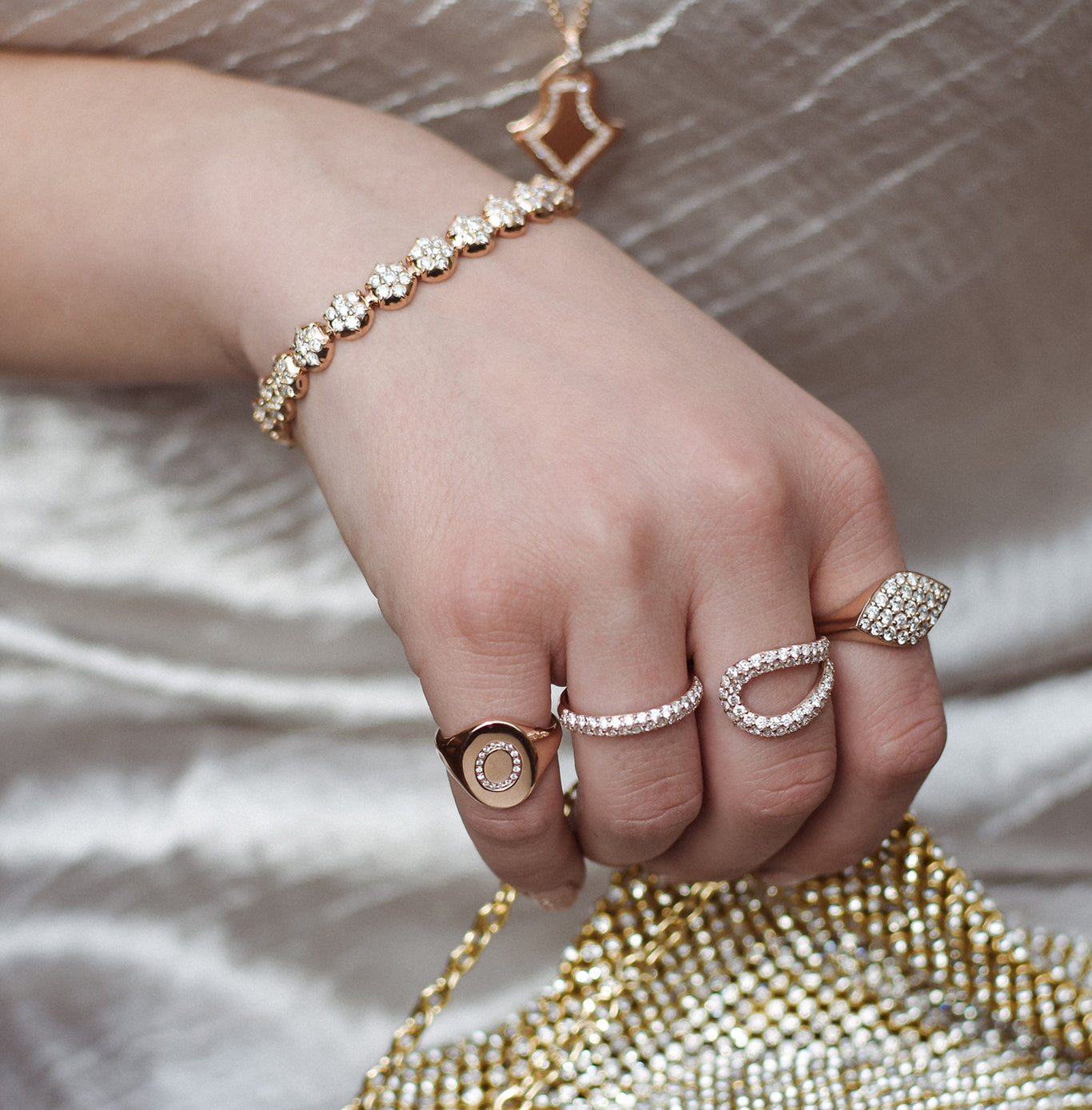 Mini Chilla Ring shown worn with the Athena Ring and Gemma Ring. The Crown Tennis Bracelet worn on the wrist.