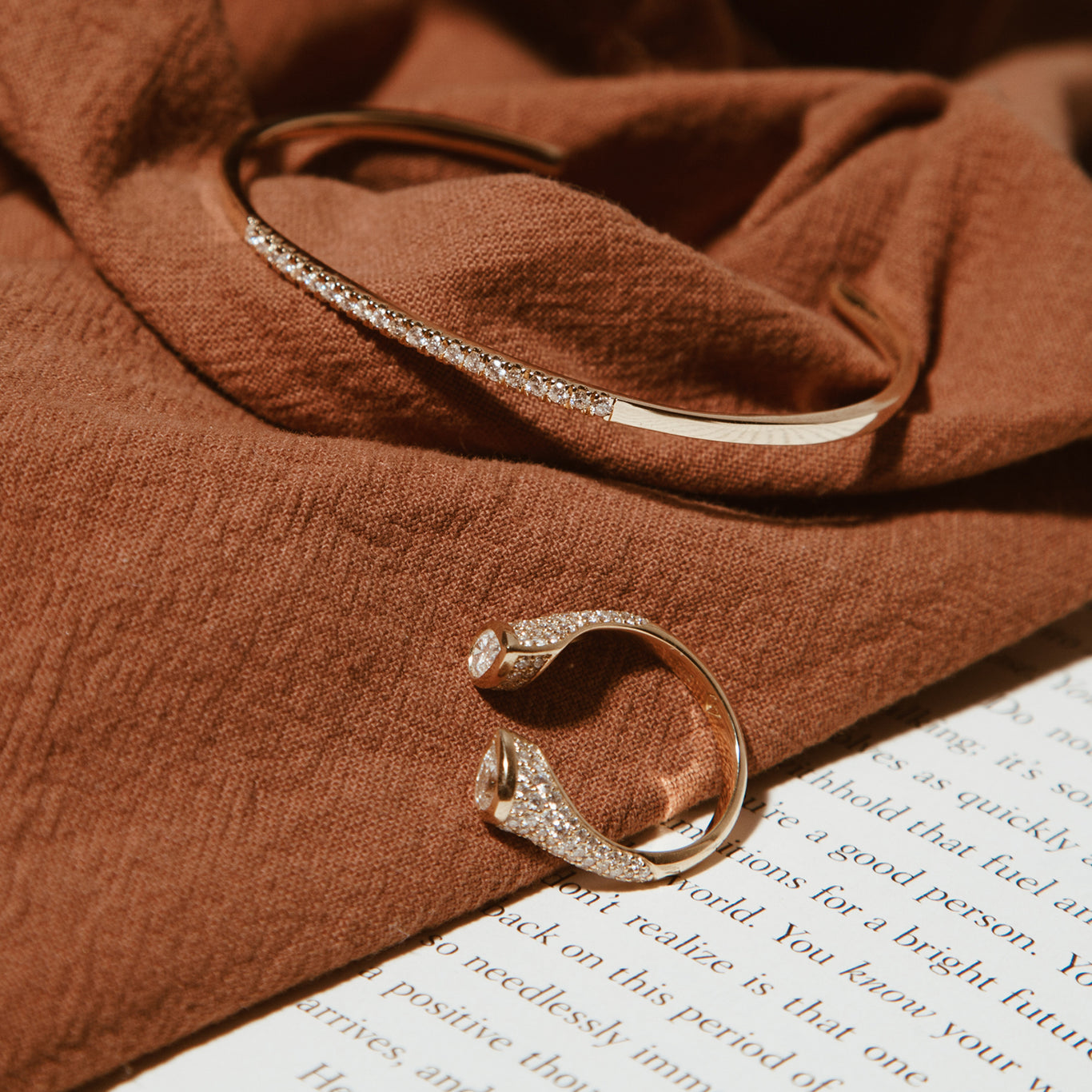 The Half Infinity Bangle shown with the Mini Twin Ring.