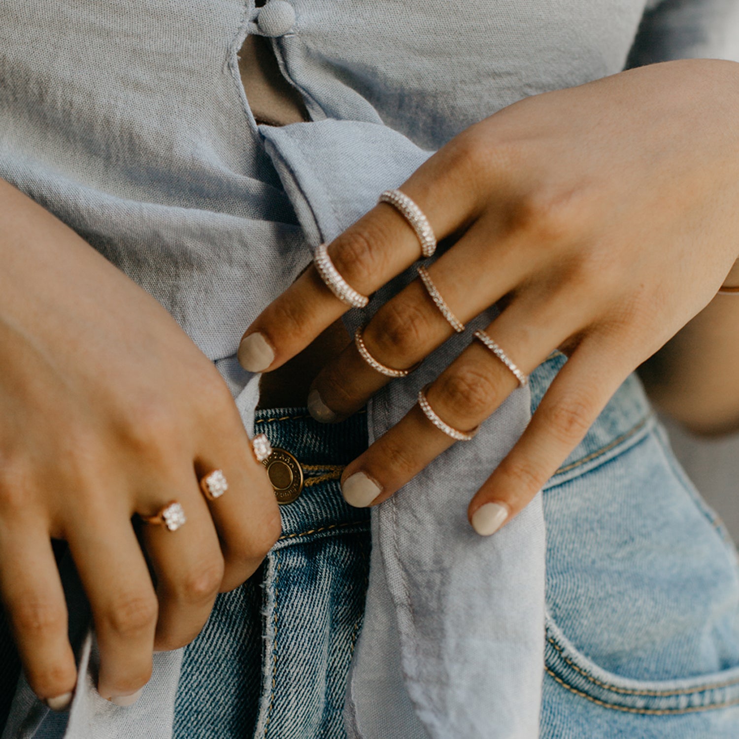 Two Olympia Rings shown with the Olympus Ring. On the other hand, the model is wearing the double finger Trilogy Ring.