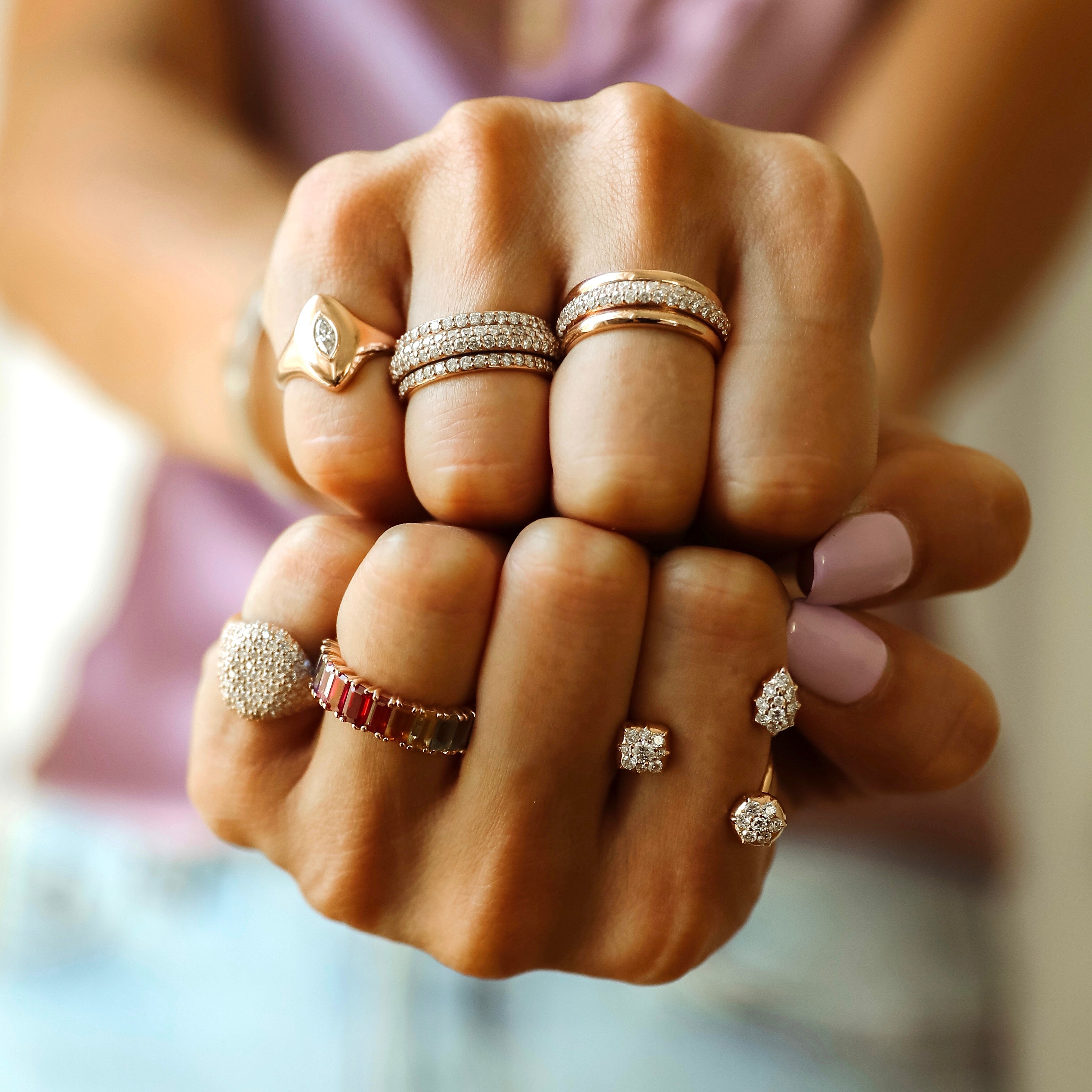 Diamond Orbit Ring shown on the Ring finger in between the gold Orbit Ring and the gold Marquis Pinky Ring.