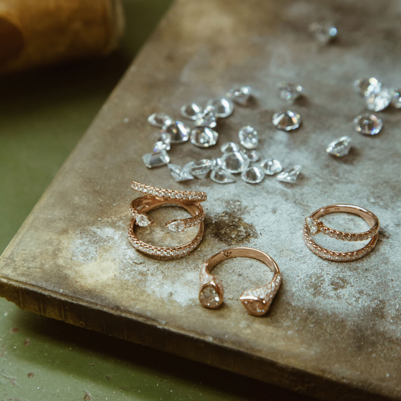The Serpent Ring shown behind the scenes in our shop with the Medium Twin Ring and Alpha Ring.