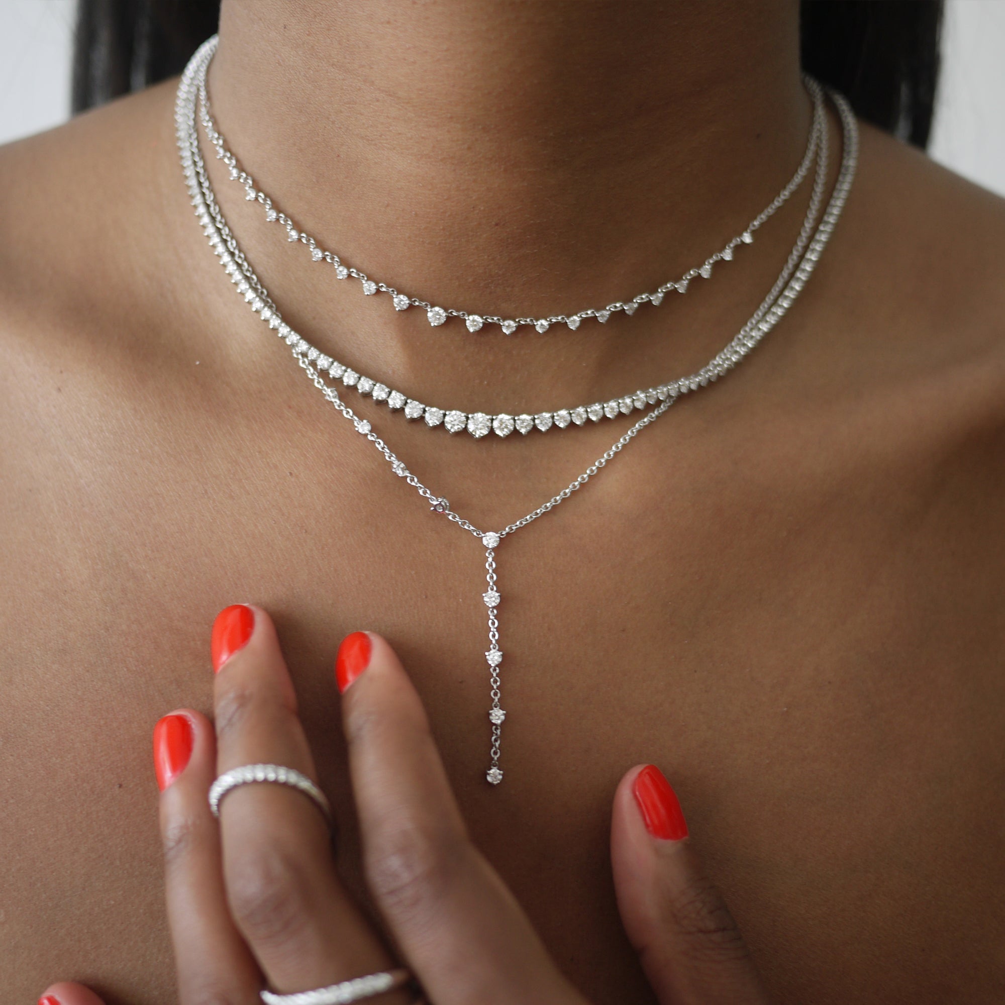 The Sparkler Lariat shown layered with the Starstruck Necklace and 6.50ct Graduated Tennis Necklace. 