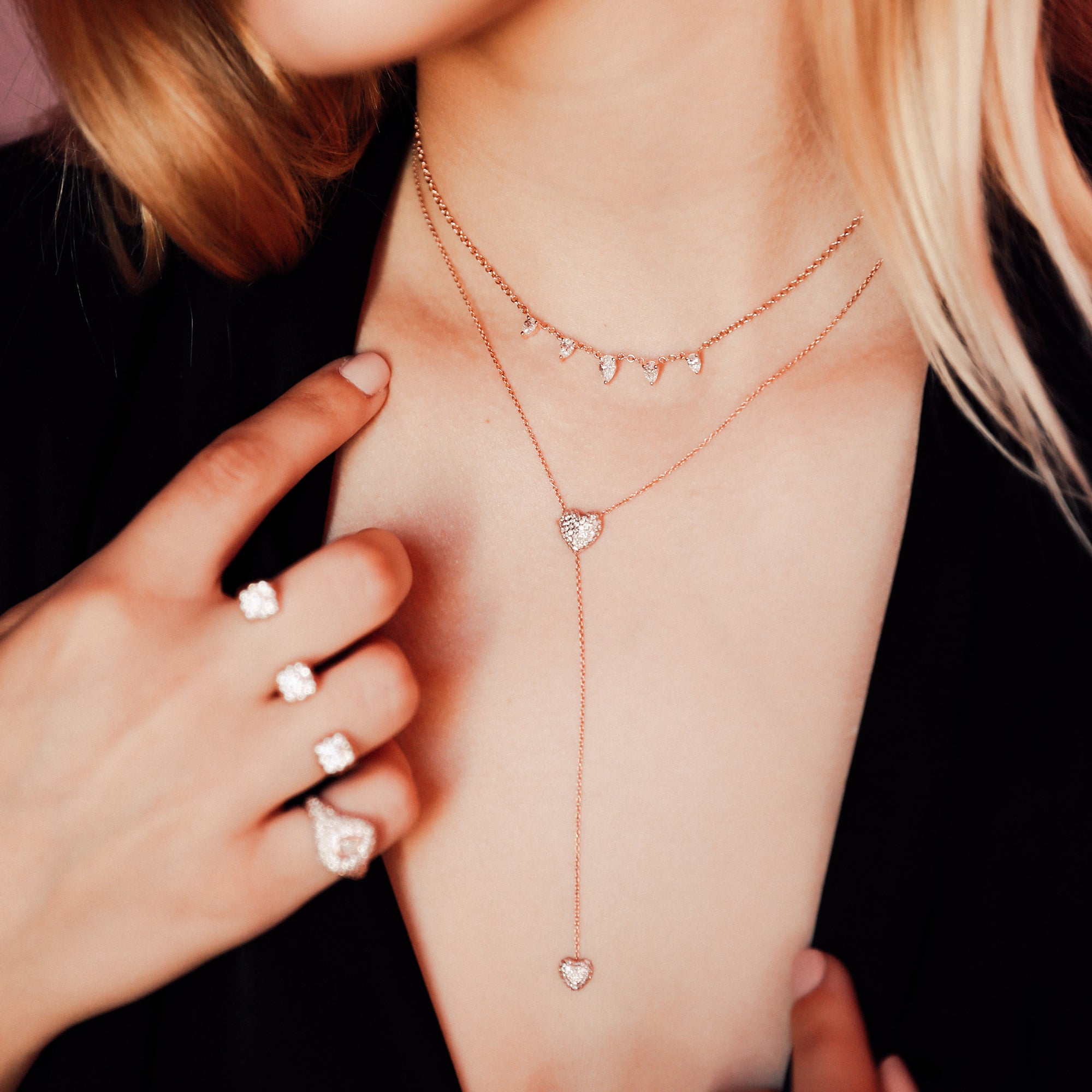 The Sweetheart Lariat shown layered with the Pear Starstruck Necklace. 