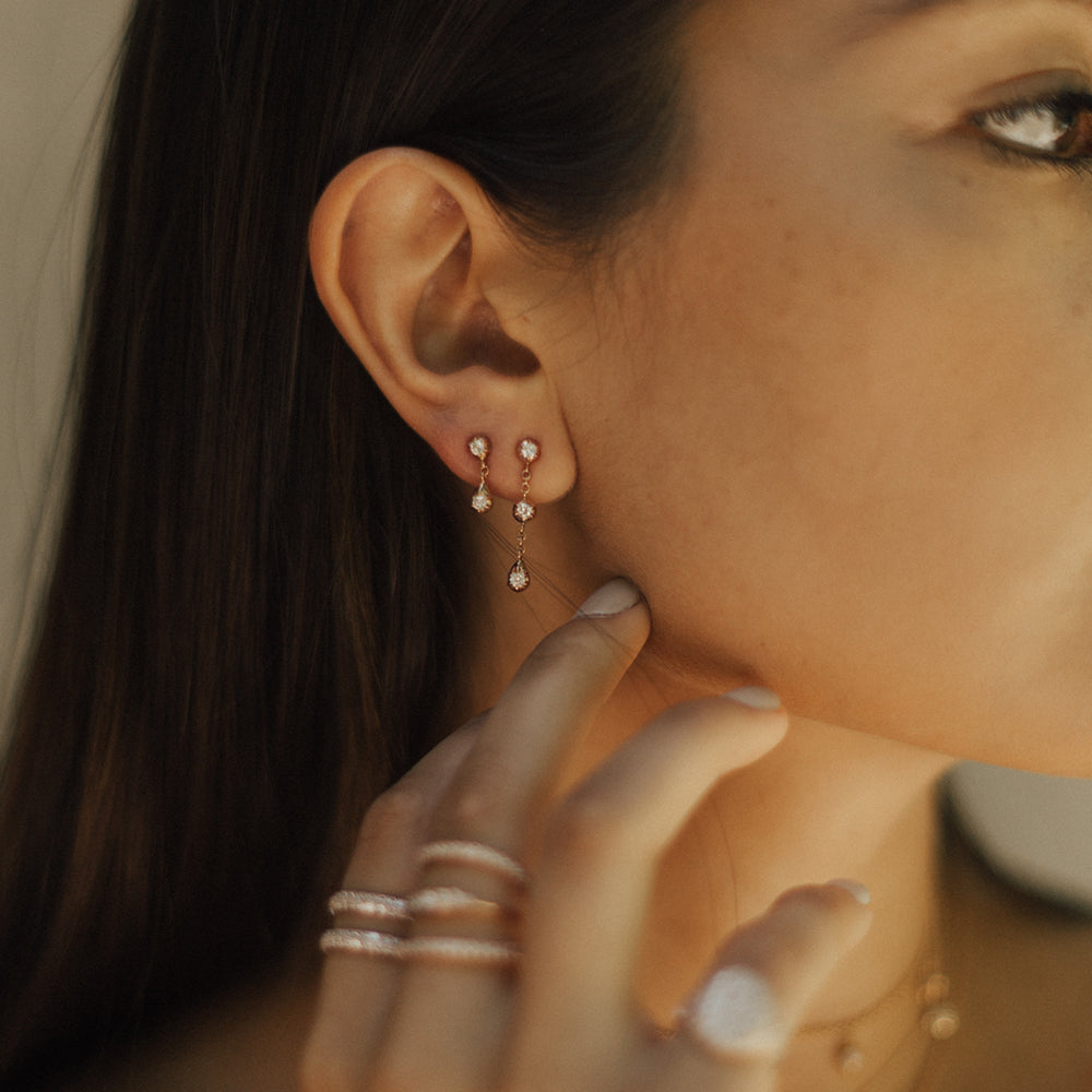 The Tulip Earring shown modeled in rose gold. 