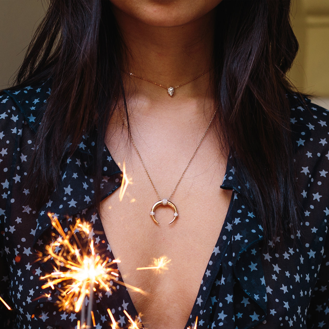 The Venus Choker Chain and Dharma Necklace shown layered together.