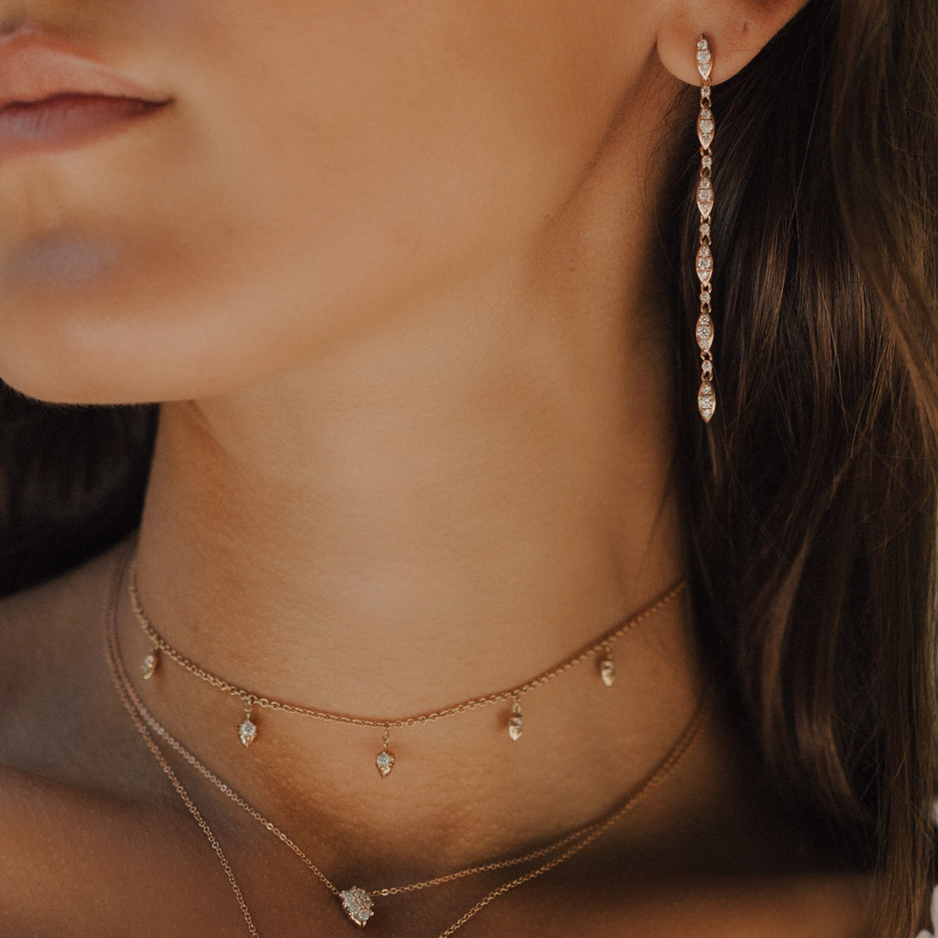 The Cascade Earrings shown paired with the Lily Choker and Venus Choker Chain.