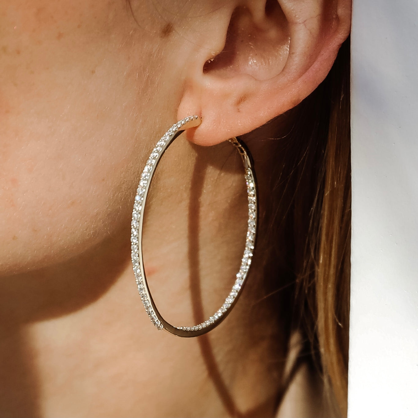 Infinity Hoops shown in White Gold
