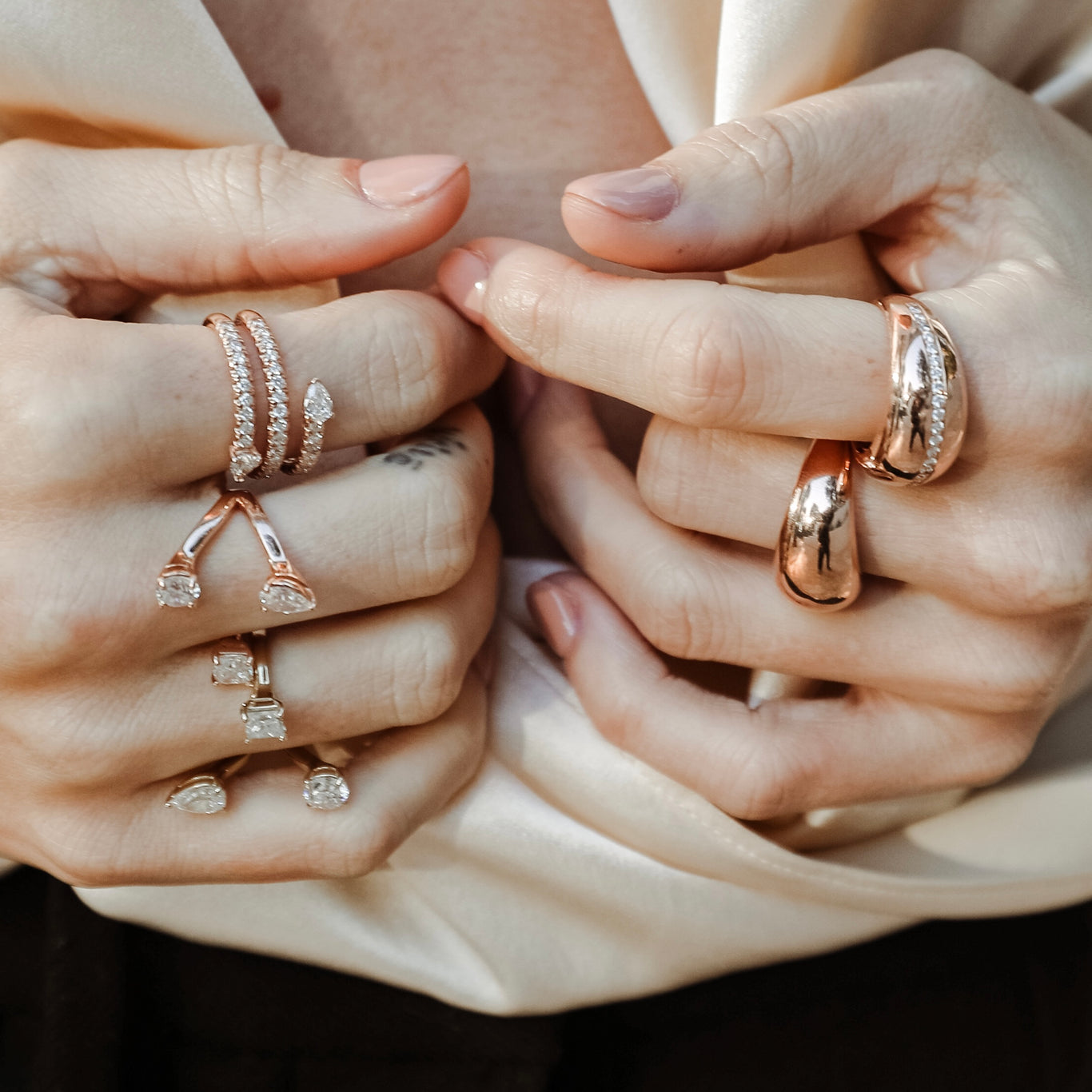 Mamba Ring shown in Rose Gold on the pointer finger