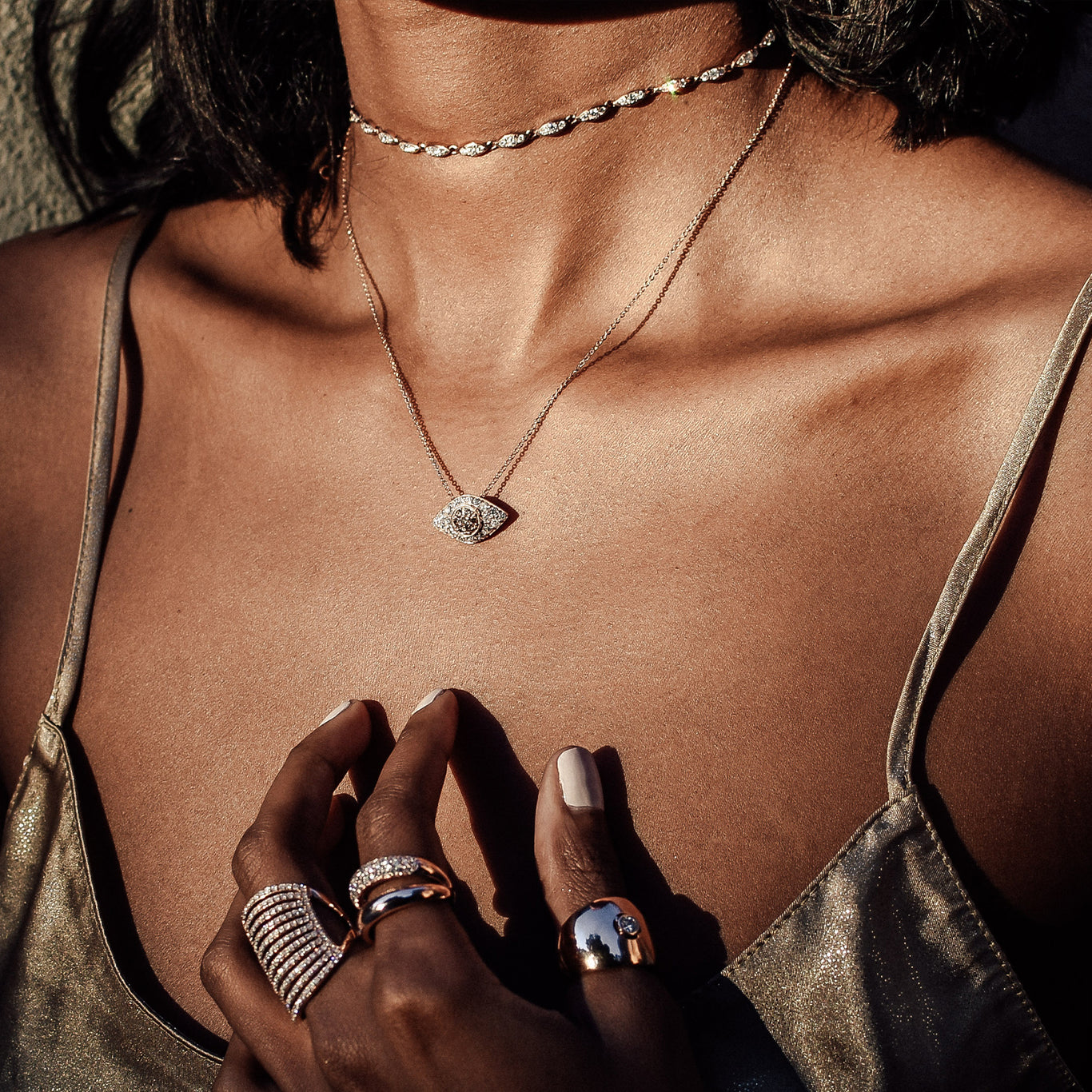 Our Drishti Necklace shown layered with the Angel Choker.