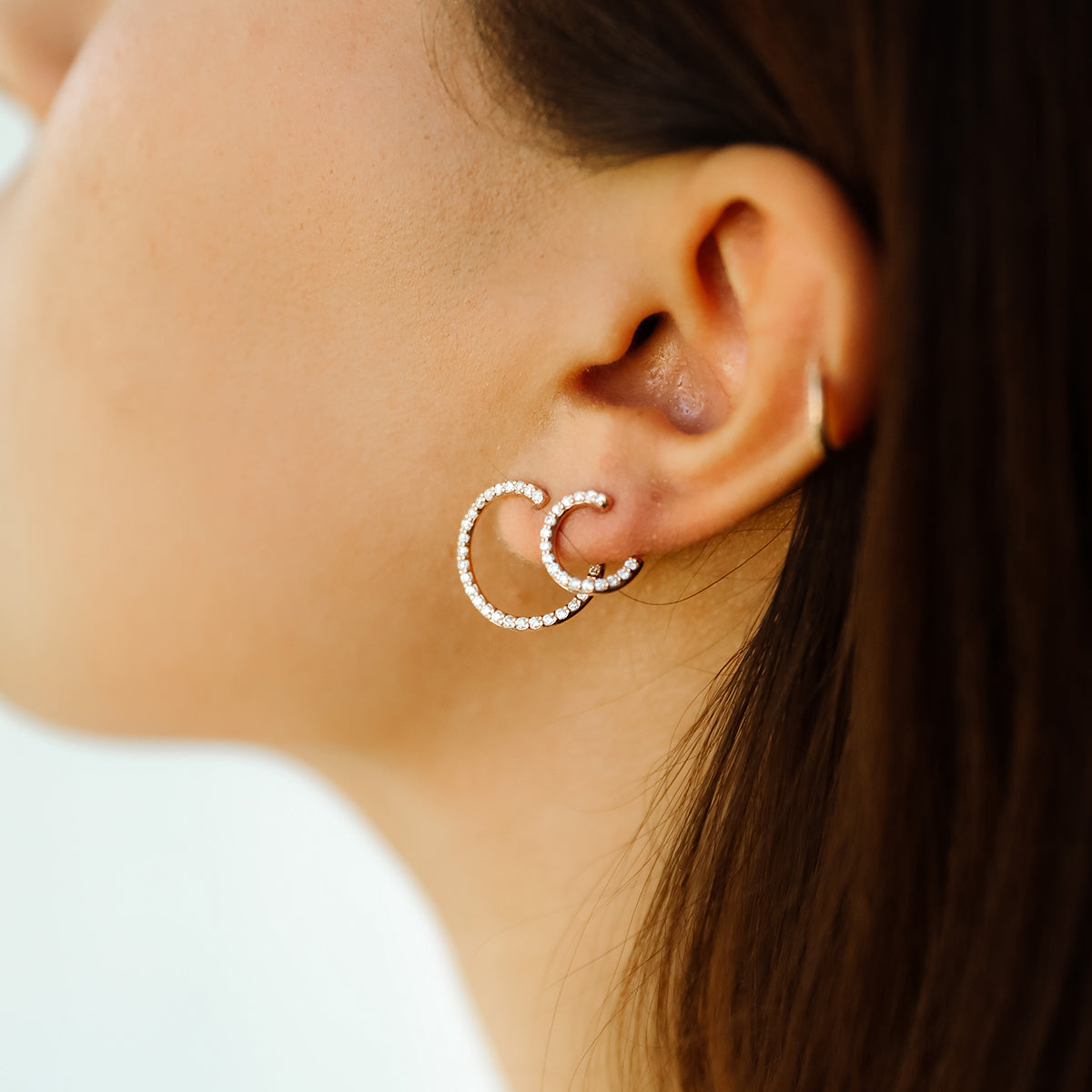 Our Swirl Hoops shown paired with the Mini Swirls Hoops.